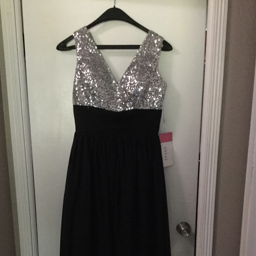 Evening gown silver sequin bodice black skirt